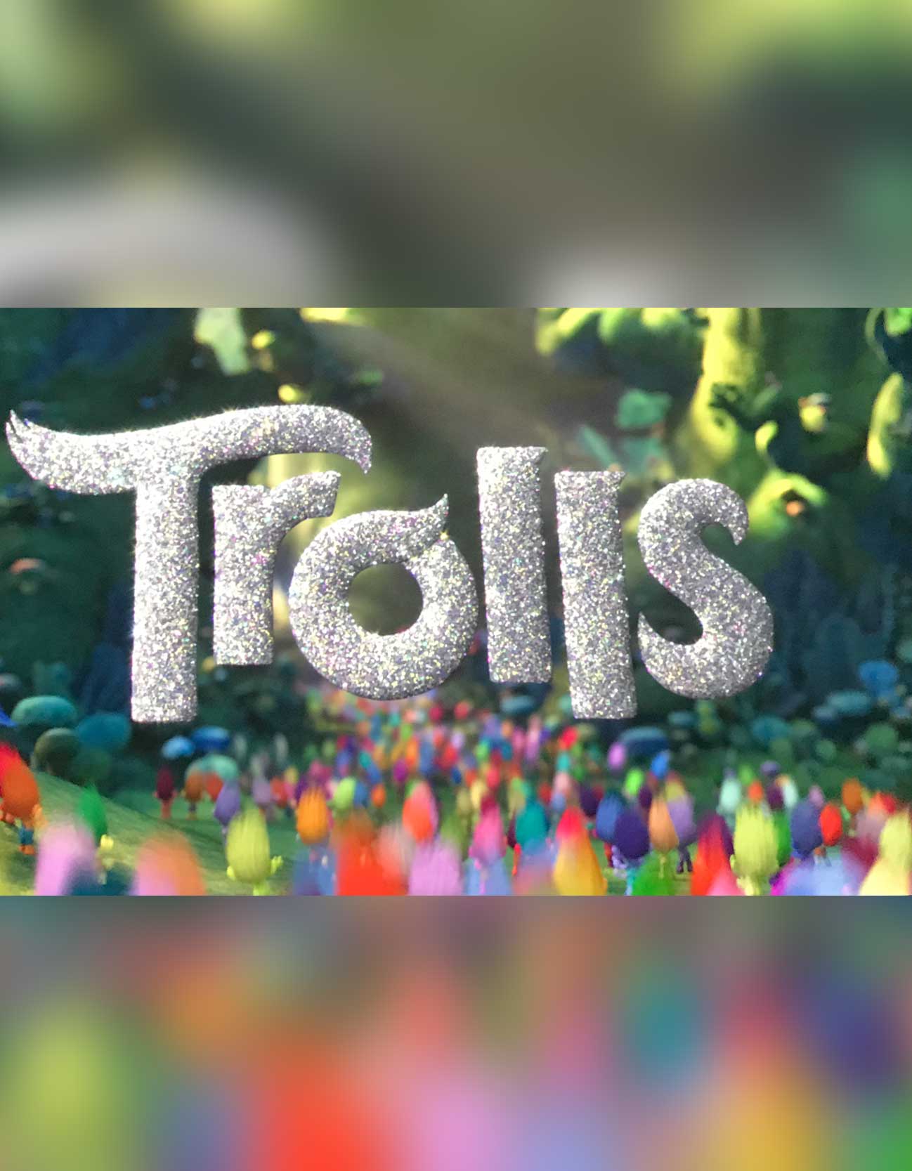 A pot of tea and a smartphone on a table